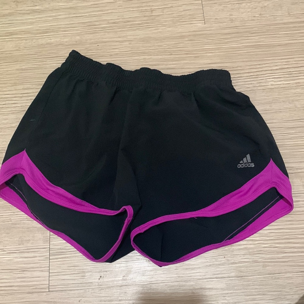 black and purple adidas shorts